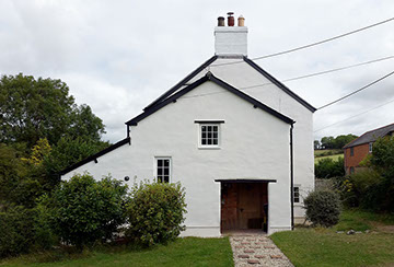 Lime rendered house Dorset